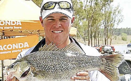 TOP CATCH: Matt Johnston from the Southern Zone with the largest bass caught last year at Somerset Dam. TOP CATCH: Matt Johnston from the Southern Zone with the largest bass caught last year at Somerset Dam.